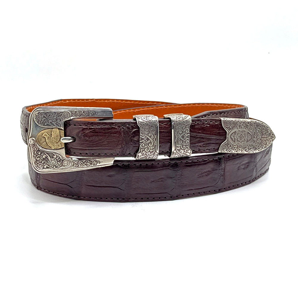 Neil Hunt belt buckle set on a brwon Caiman crocodile belt strap.