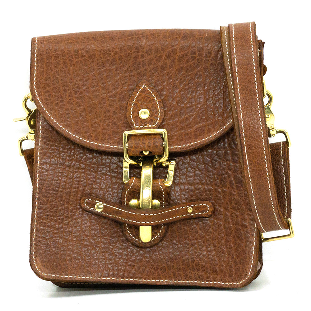Billy Sunday amber bison leather mini messenger bag.