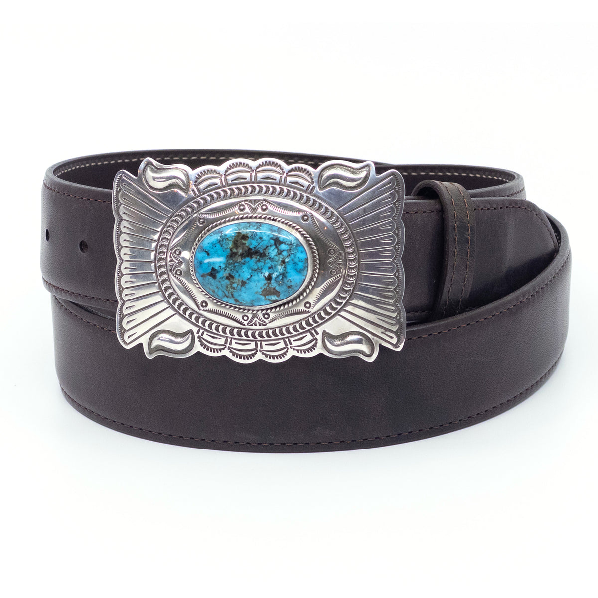 Chacon turquoise belt buckle shown on a chocolate ranch leather belt.