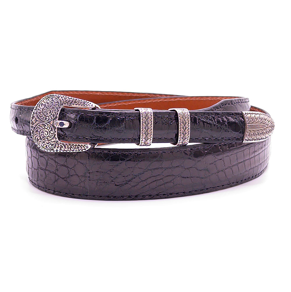 Neil Hunt Manzantia buckle set with sapphire shown on a black alligator belt strap.