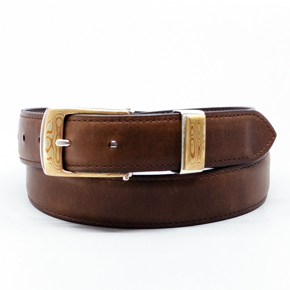 Neil Hunt Mokune-Gane buckle and keeper on a cuyo ranch leather belt strap.