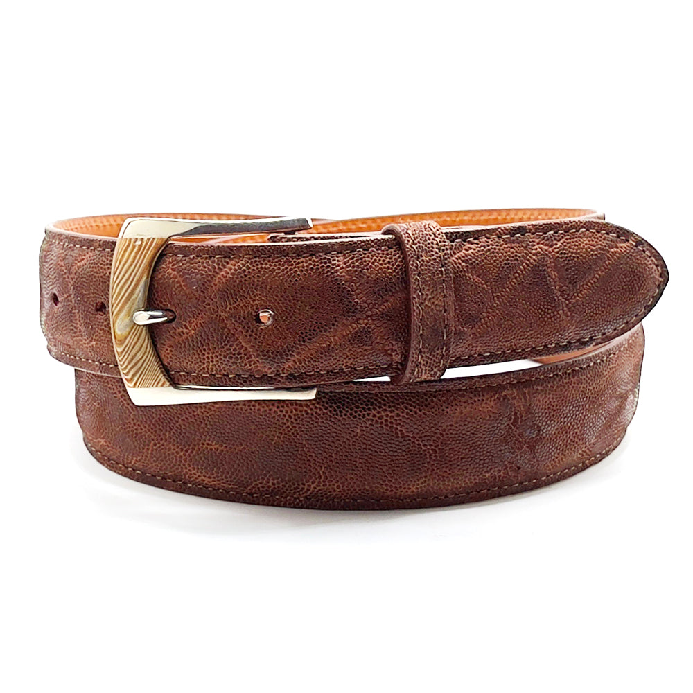 Neil Hunt Mokume-Gane buckle on a chestnut alligator belt strap.