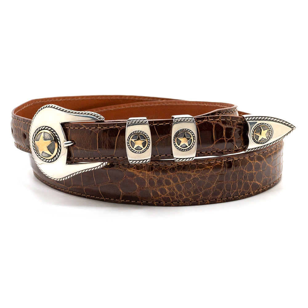 RDM Ropestar with 18k gold stars belt buckle set shown on a cognac alligator belt strap.