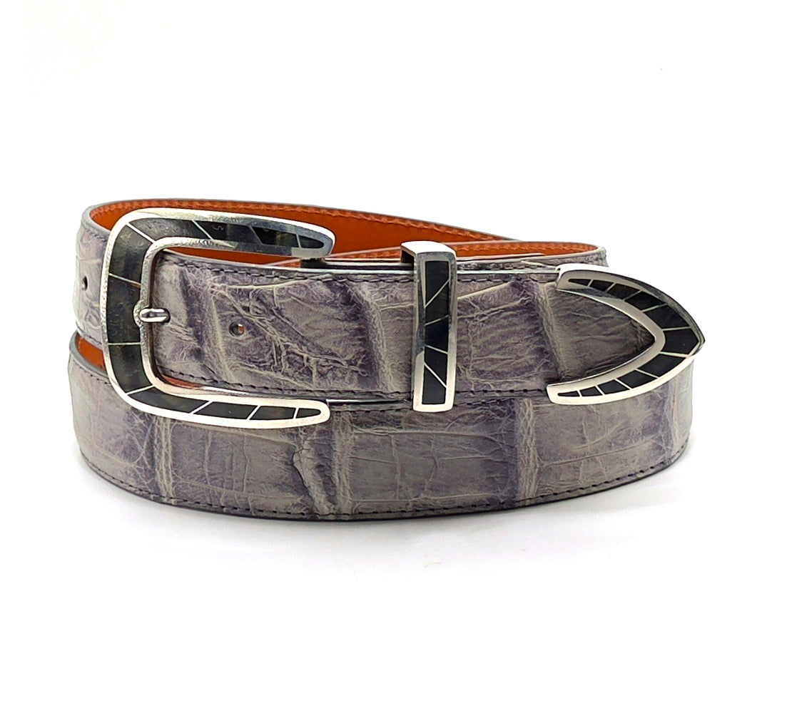 Chacon Caliente buckle set with blue tigereye shown on a gray gnarly alligator belt strap.