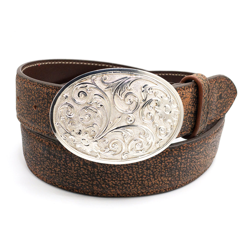 Sterling filigree overlay oval Silver King belt buckle shown on a cognac cape buffalo belt strap.