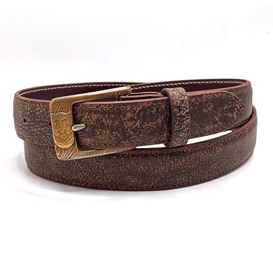 Neil Hunt Mokume-Gane buckle with a yellwo bronze tiger shown on a cape buffalo belt strap.