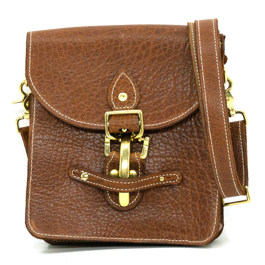 Billy Sunday amber bison leather mini messenger bag.