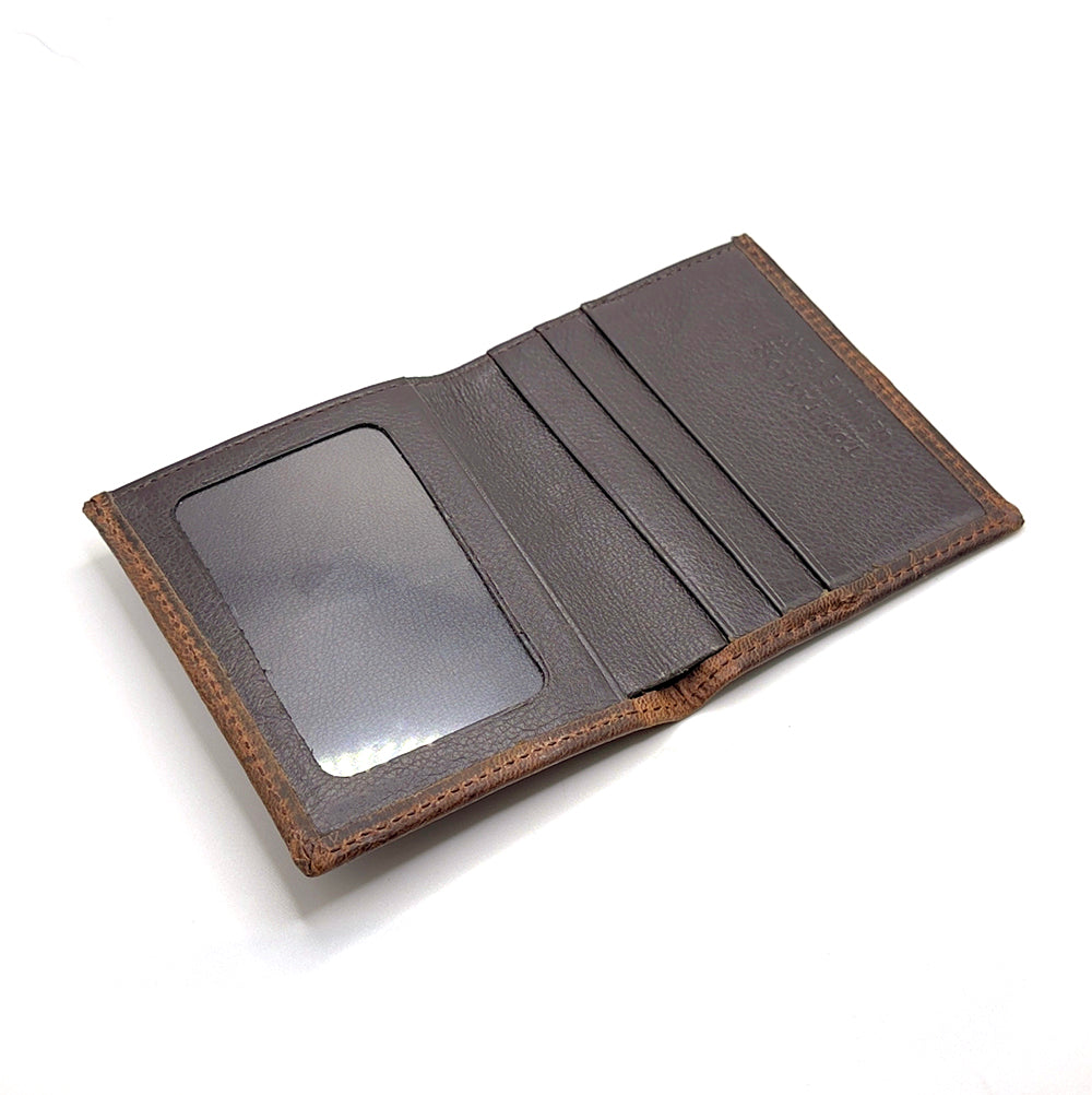 Goatskin bi-fold interior.