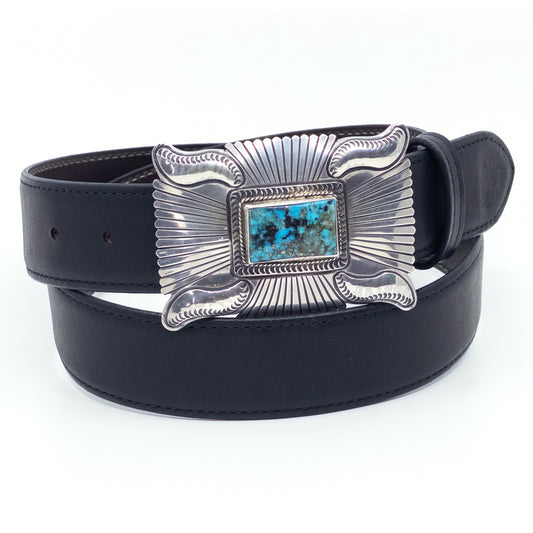 Chacon turquoise belt buckle shown on a black ranch leather belt.