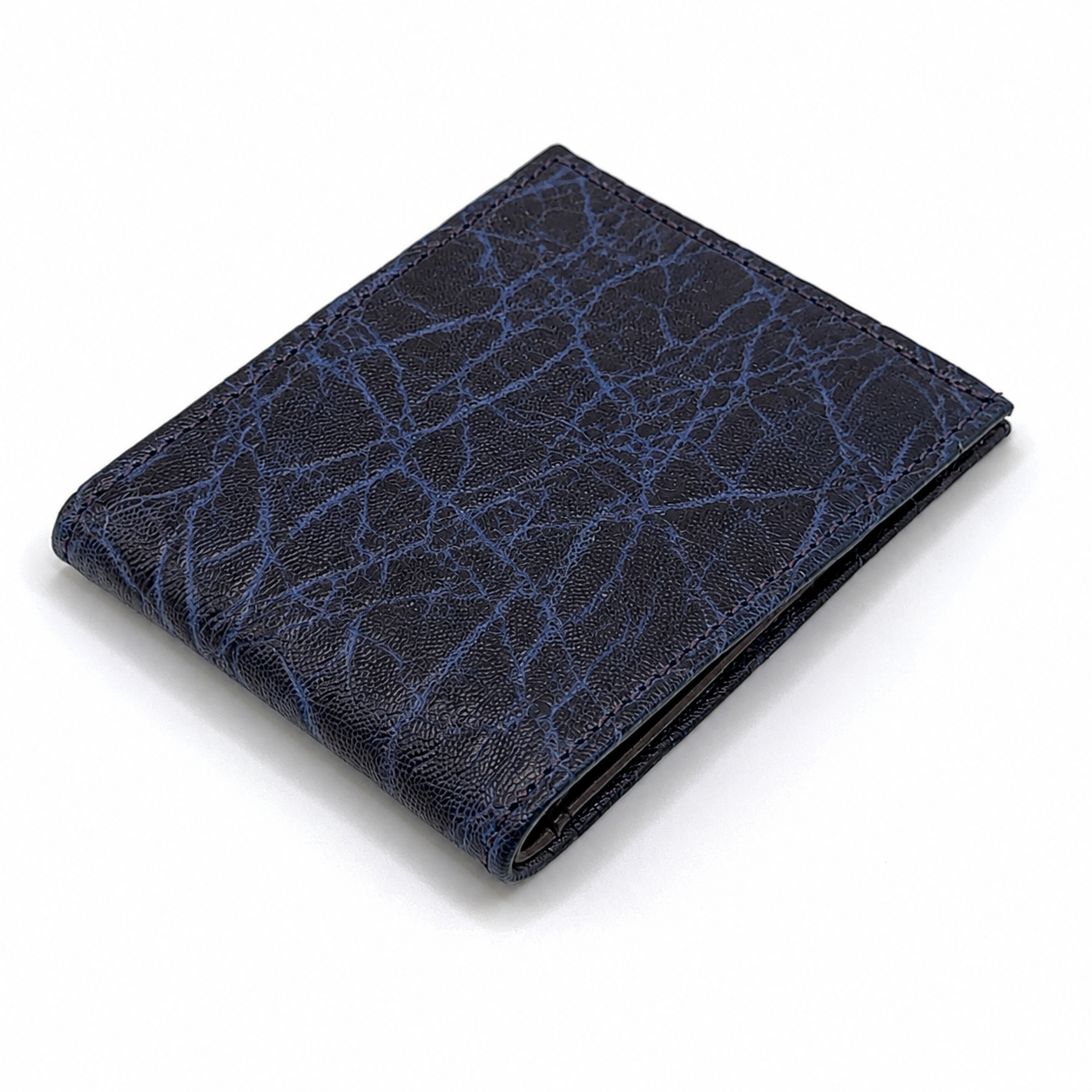 Dark denim elephant slim-fold wallet.