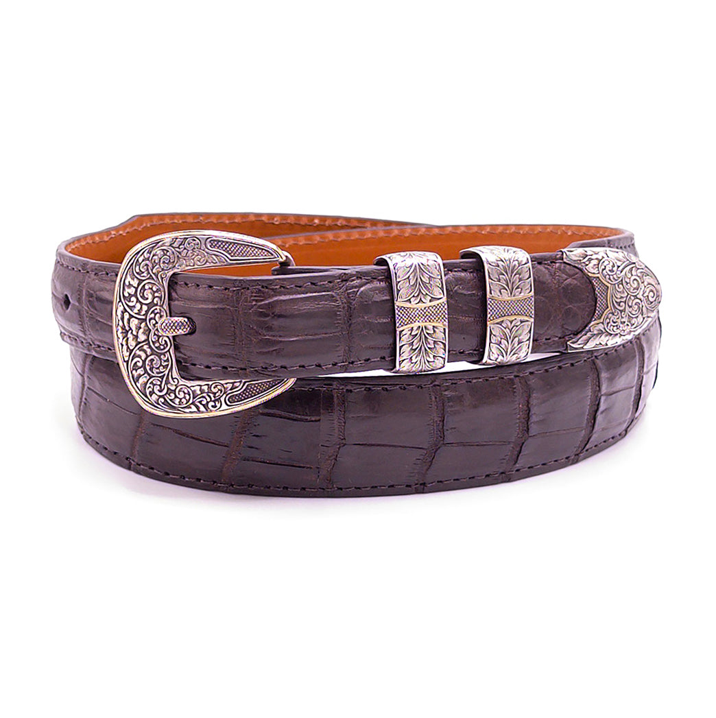Neil Hunt Fox stterling silver with 24K gold belt buckle set shown on a brown Nile crocodile belt strap.
