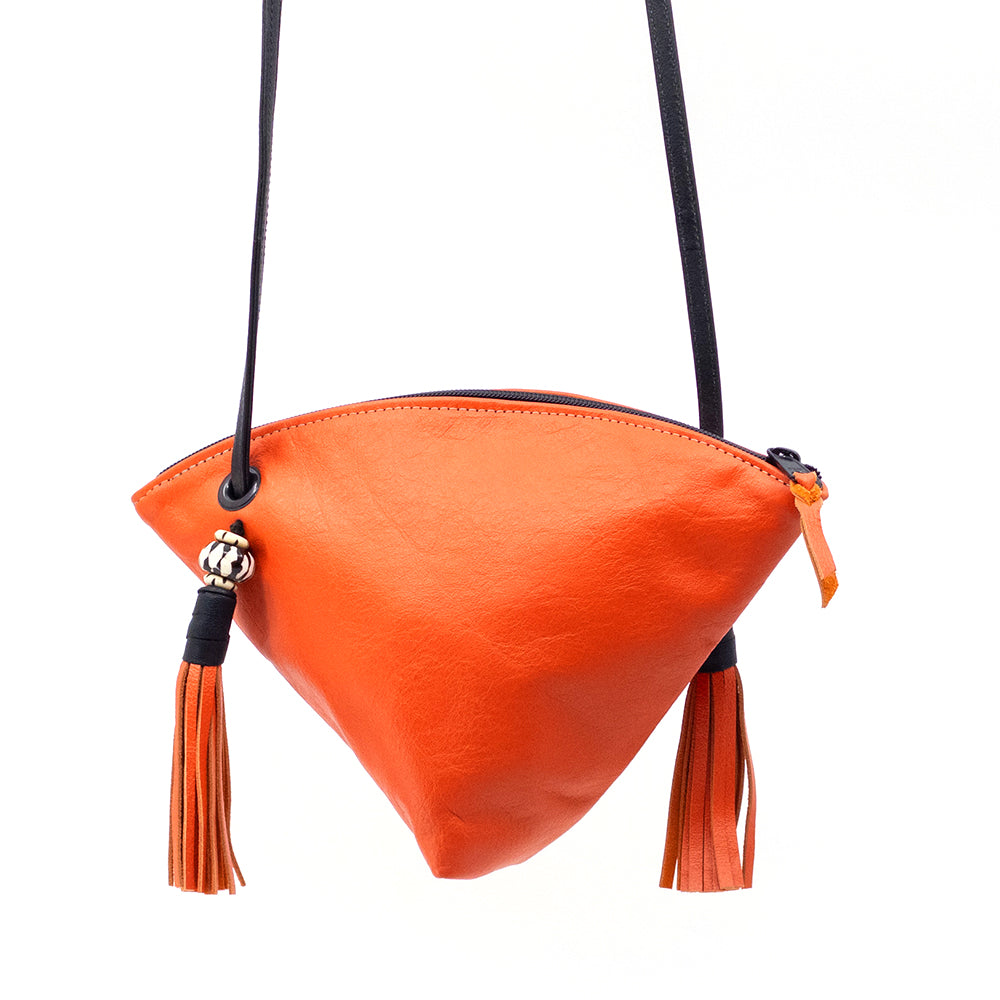Orange leather Fortune Cookie crossbody bag.