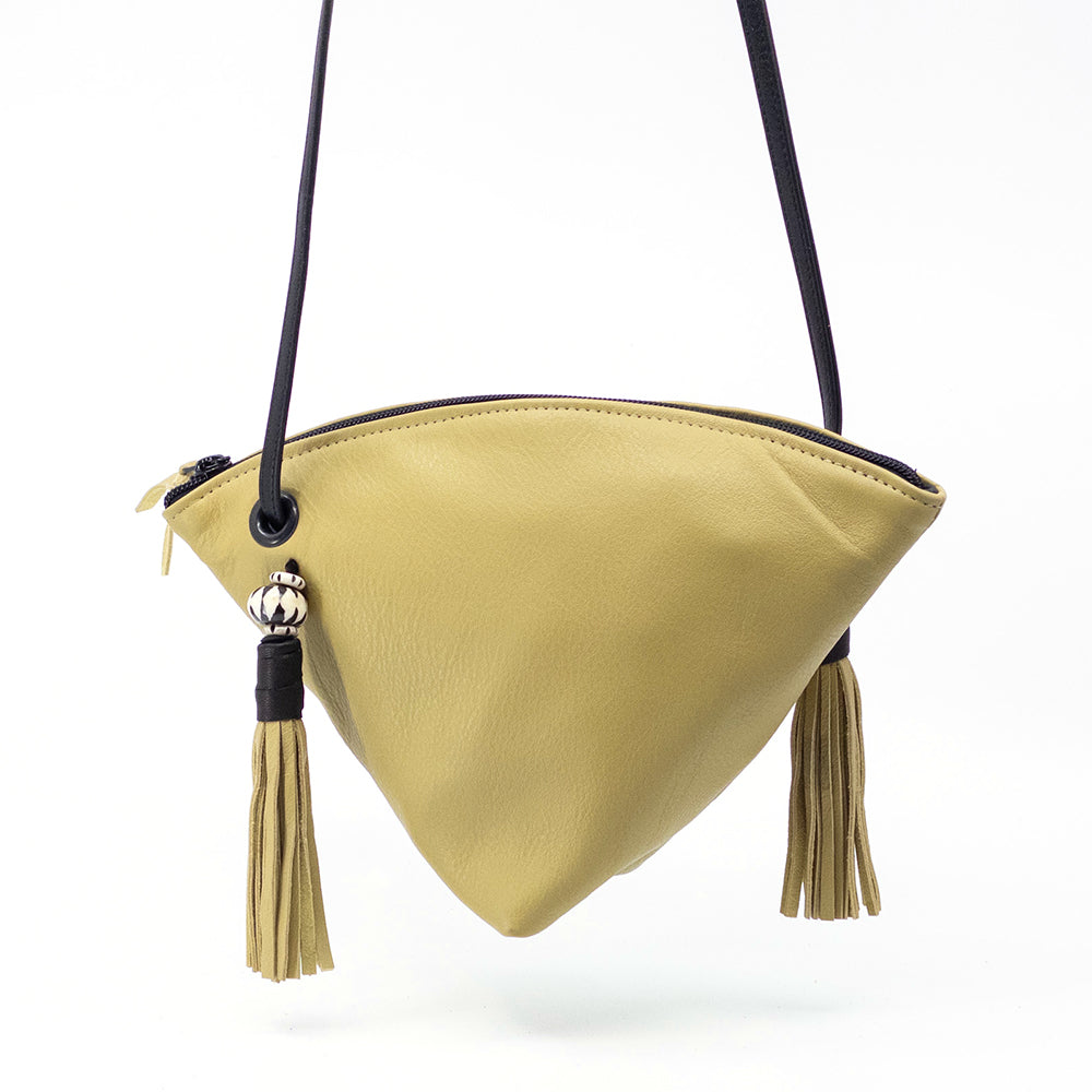 Palomino leather Fortune Cookie crossbody bag.