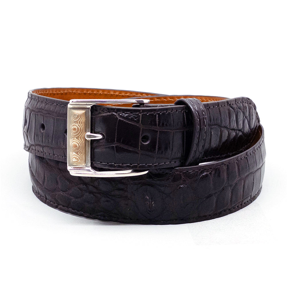 Neil Hunt Dresden Mokume-Gane belt buckle on a brown Nile crocodile belt strap.