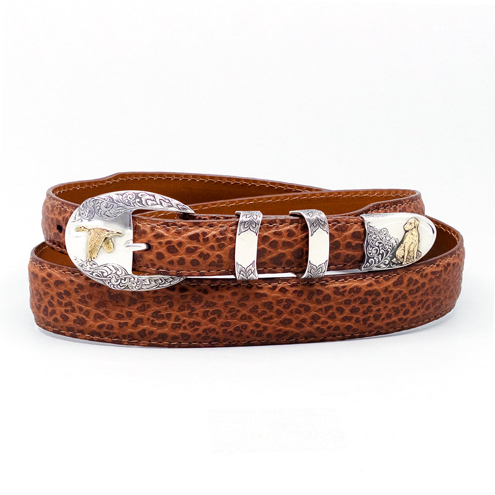 Neil Hunt Mallard & Retriever belt buckle set shown on a cognac American bison leather belt