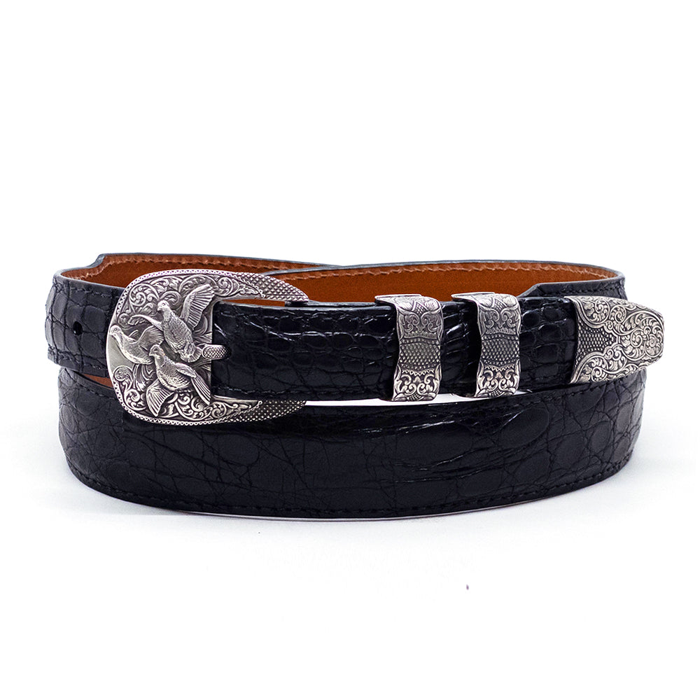Neil Hunt engraved sterling silver belt buckle set with three quail shown on a black Caiman tail belt strap.