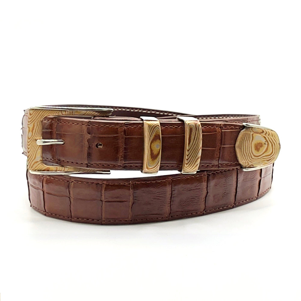 Neil Hunt Mokume-Gane buckle set on a cognac alligaotr belt.