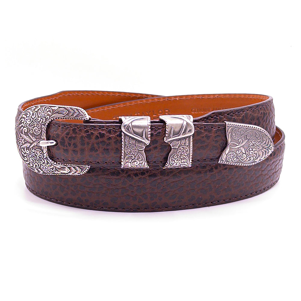 Neil Hunt Roosevelt Buckle buckle set shown on a brown bison belt strap.