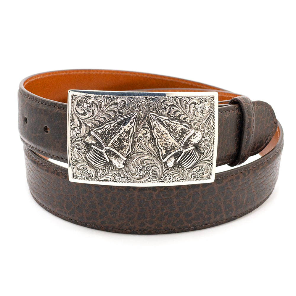 Engraved sterling silver with two silver arrowheads Silver King belt buckle shown on a brown bison belt strap.