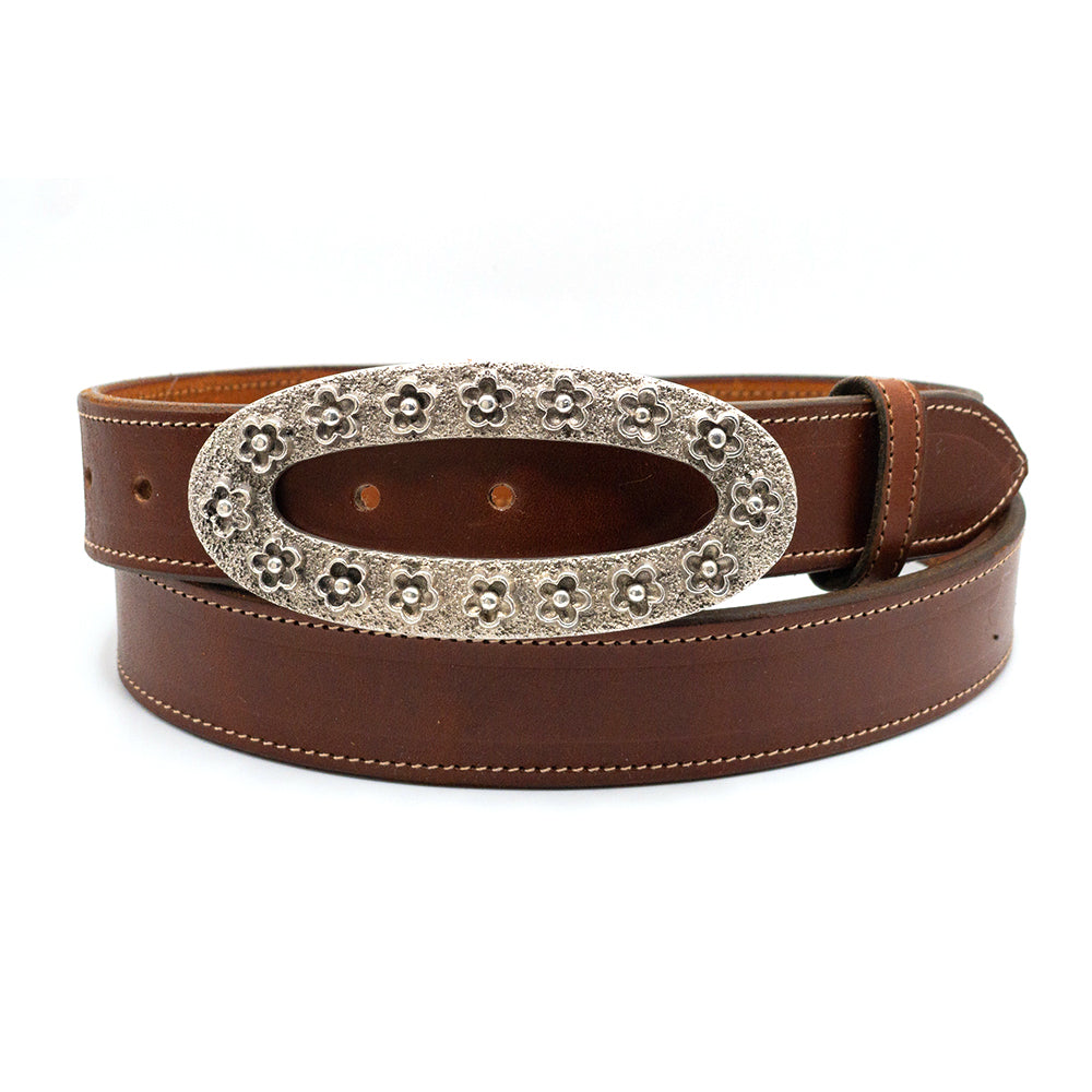 Dughlas James Sweet Sixteen belt buckle shown on a cognac bridle belt.