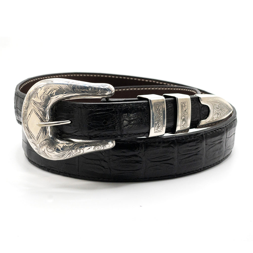 Sunset Trails engraved sterling silver one inch Tombstone buckile set shown on a black corocodile belt strap.