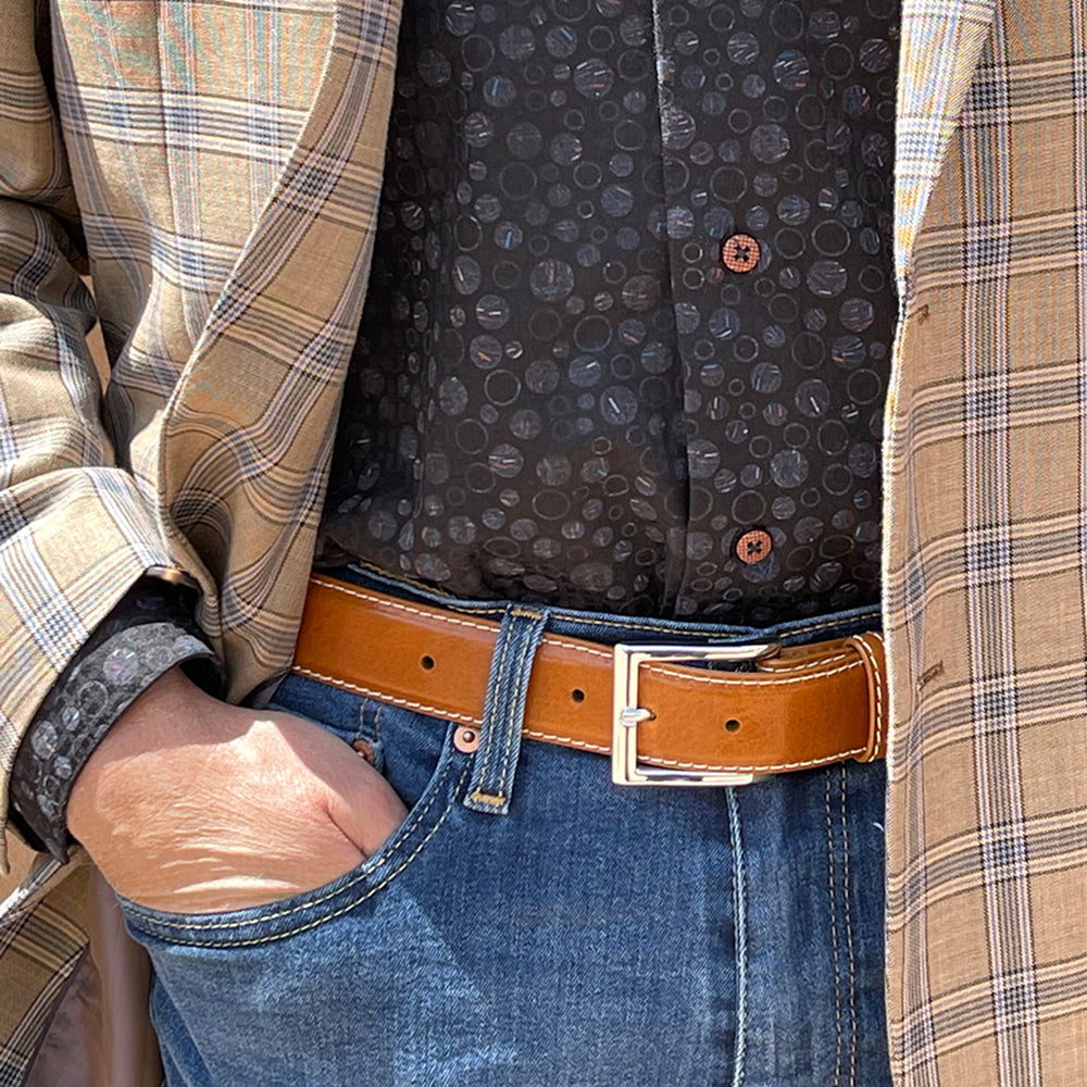 Waist veiw of a man waering the limited edition Italian calf belt.